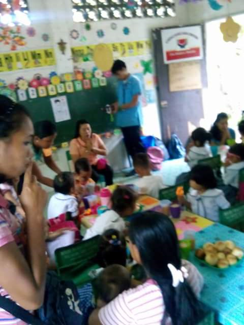 6-teaching and giving milk and bread in the class rooms