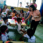 7-teachings giving milk and bread in class room